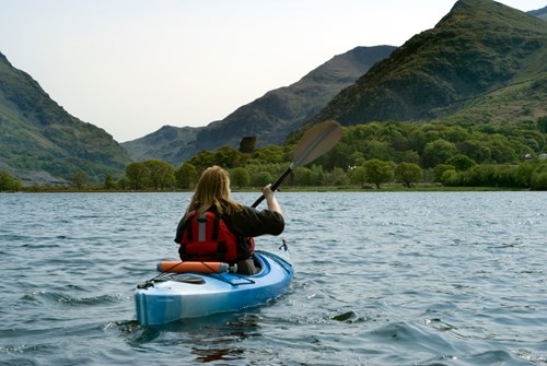 Lady on kayak Llyn Padarn