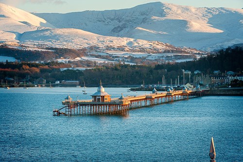 Bangor Pier and view of Snowdonia in the background